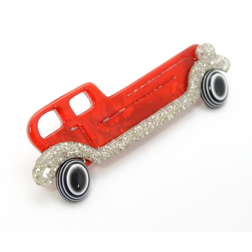 876 - Lea Stein Paris : A brooch formed as a vintage car. Approx. 2 3/4