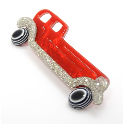 876 - Lea Stein Paris : A brooch formed as a vintage car. Approx. 2 3/4