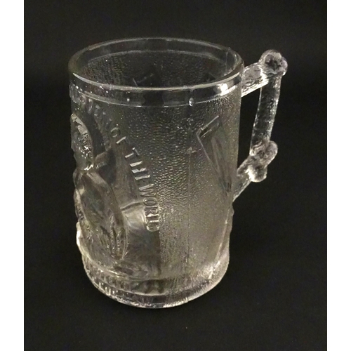 219 - British / Australian Rowing Interest: A glass tankard titled 'Edward Hanlan Champion of the World No... 