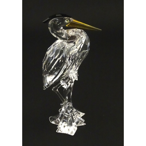 228 - A Swarovski crystal model of a heron.  Approx. 5 3/4