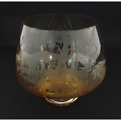 246 - A vintage amber to clear glass bowl with etched decoration depicting a horse and children collecting... 