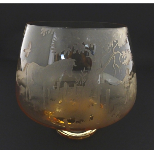 246 - A vintage amber to clear glass bowl with etched decoration depicting a horse and children collecting... 