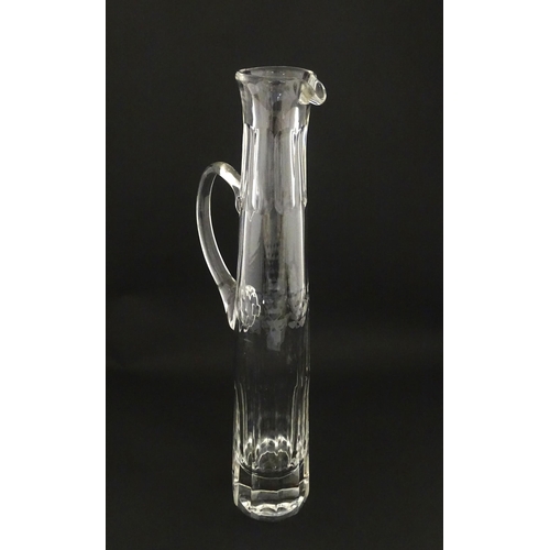 263 - A William Yeoward tall crystal glass champagne jug / cocktail pitcher of elongated form. Approx. 19