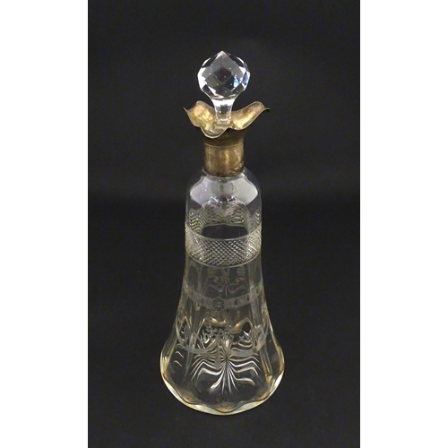 265 - A cut glass decanter with silver mounts hallmarked Birmingham 1911. Approx. 9 1/4