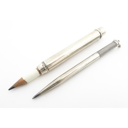 1215 - Two silver propelling pencils by Sampson Mordan, one hallmarked London 1919, the other 1927. Largest... 