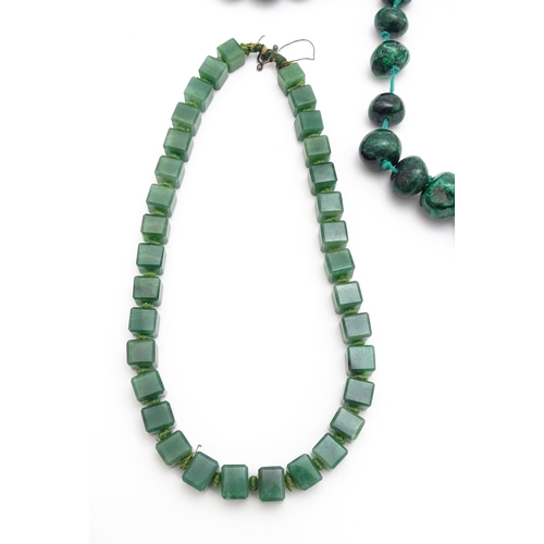 889 - A quantity of assorted green bead necklaces to include jade coloured beads, hardstone, malachite, et... 