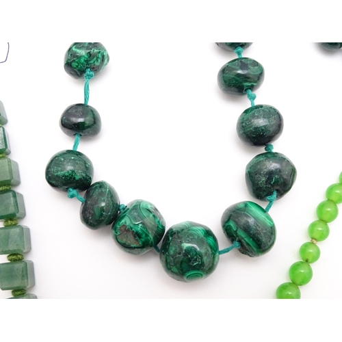 889 - A quantity of assorted green bead necklaces to include jade coloured beads, hardstone, malachite, et... 