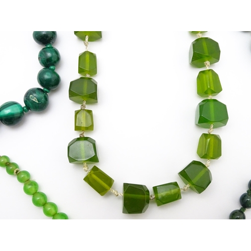 889 - A quantity of assorted green bead necklaces to include jade coloured beads, hardstone, malachite, et... 