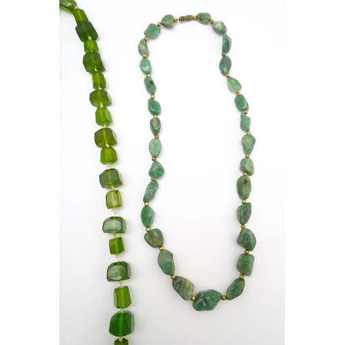 889 - A quantity of assorted green bead necklaces to include jade coloured beads, hardstone, malachite, et... 