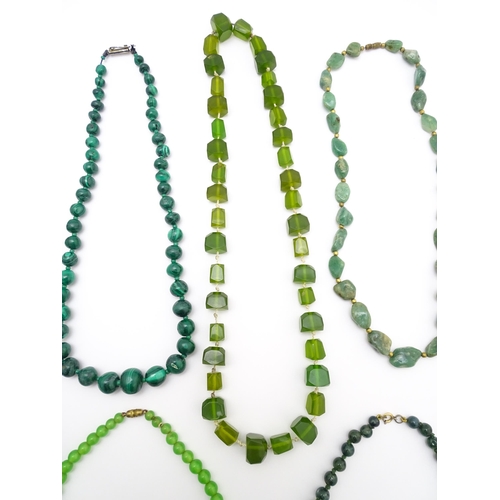 889 - A quantity of assorted green bead necklaces to include jade coloured beads, hardstone, malachite, et... 