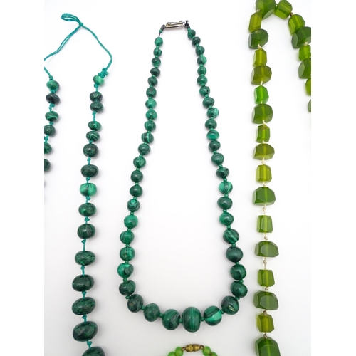 889 - A quantity of assorted green bead necklaces to include jade coloured beads, hardstone, malachite, et... 