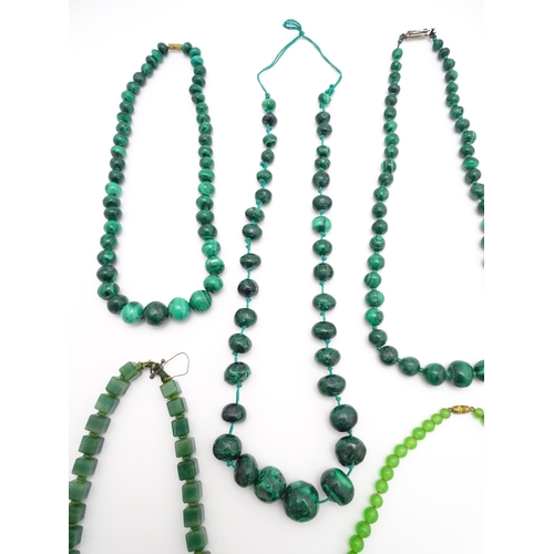 889 - A quantity of assorted green bead necklaces to include jade coloured beads, hardstone, malachite, et... 