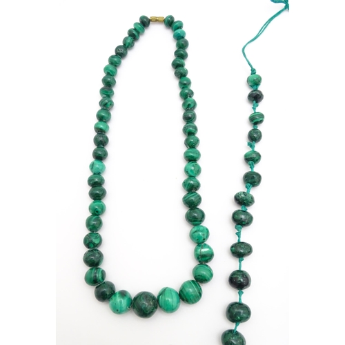 889 - A quantity of assorted green bead necklaces to include jade coloured beads, hardstone, malachite, et... 