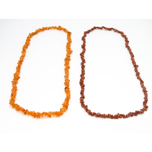 893 - Two vintage bead necklaces of polished hardstone and amber specimen beads. Approx. 34