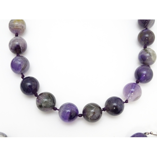 896 - Assorted amethyst hardstone bead necklaces. Longest approx. 28