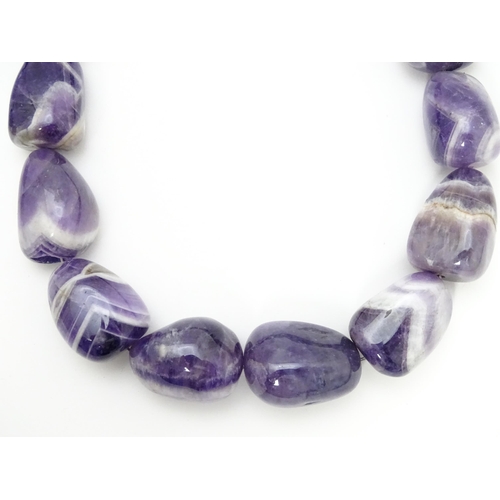 896 - Assorted amethyst hardstone bead necklaces. Longest approx. 28