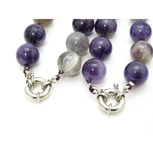 896 - Assorted amethyst hardstone bead necklaces. Longest approx. 28