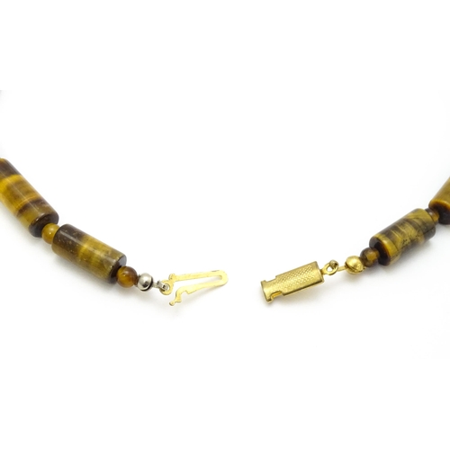 900 - Assorted tigers eye bead necklaces. Longest approx. 34