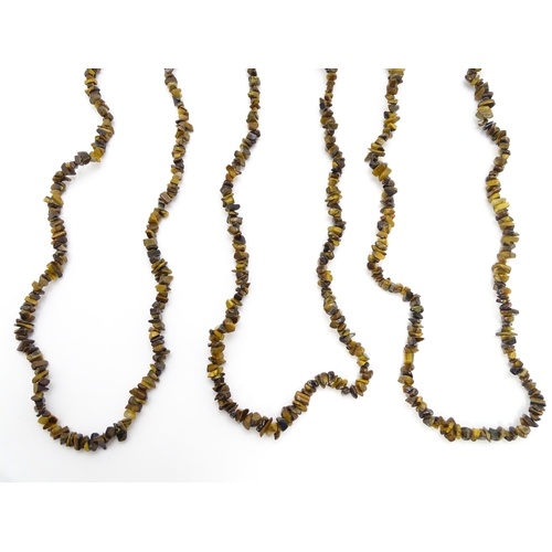 900 - Assorted tigers eye bead necklaces. Longest approx. 34