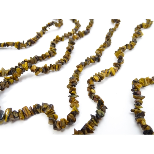 900 - Assorted tigers eye bead necklaces. Longest approx. 34