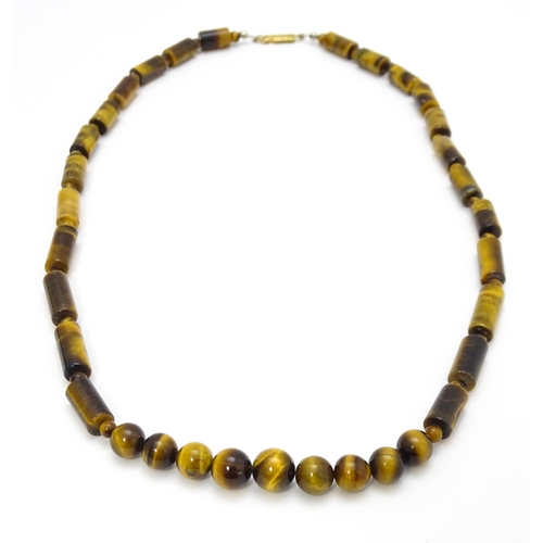 900 - Assorted tigers eye bead necklaces. Longest approx. 34