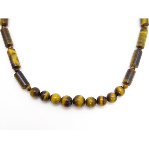 900 - Assorted tigers eye bead necklaces. Longest approx. 34