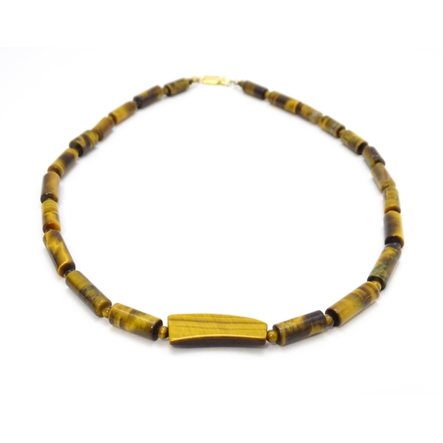 900 - Assorted tigers eye bead necklaces. Longest approx. 34