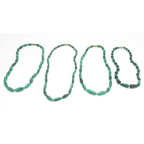 901 - Four assorted malachite bead necklaces. Longest approx. 22