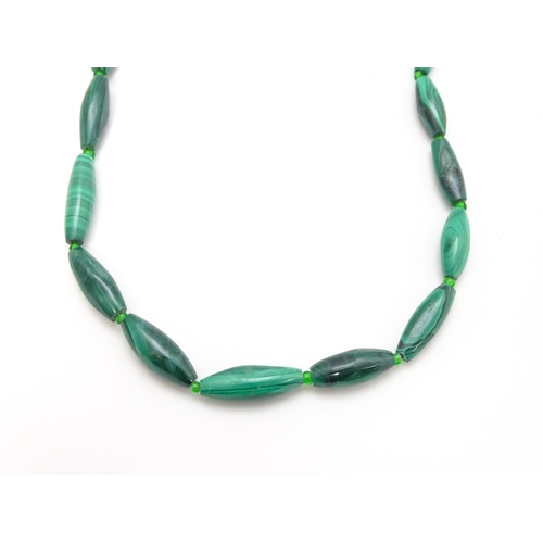 901 - Four assorted malachite bead necklaces. Longest approx. 22