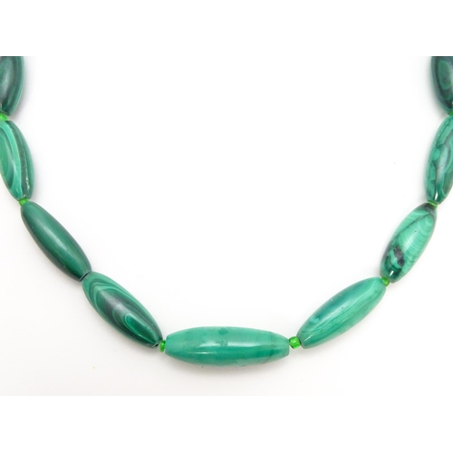 901 - Four assorted malachite bead necklaces. Longest approx. 22