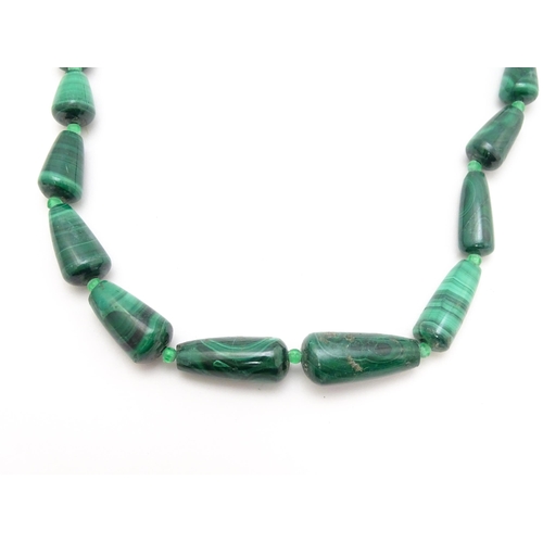 901 - Four assorted malachite bead necklaces. Longest approx. 22