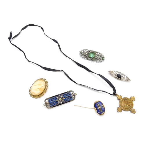 906 - Assorted brooches, etc. to include a gold brooch with enamel and seed pearl detail, a .935 silver br... 