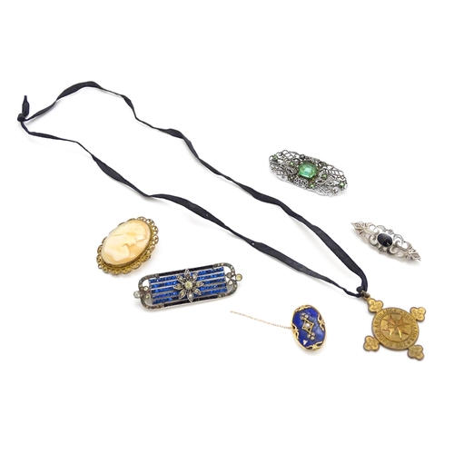 906 - Assorted brooches, etc. to include a gold brooch with enamel and seed pearl detail, a .935 silver br... 