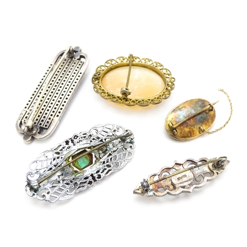 906 - Assorted brooches, etc. to include a gold brooch with enamel and seed pearl detail, a .935 silver br... 