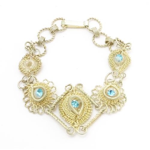 913 - Assorted white metal filigree jewellery to include bracelets etc.