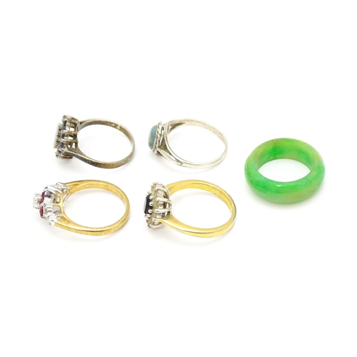 915 - Five assorted dress rings to include a silver examples (5)