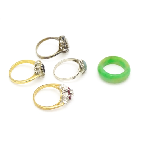 915 - Five assorted dress rings to include a silver examples (5)