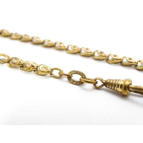 923 - A rolled gold / plated watch chain with star detail. Approx. 18