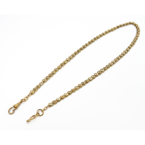 923 - A rolled gold / plated watch chain with star detail. Approx. 18