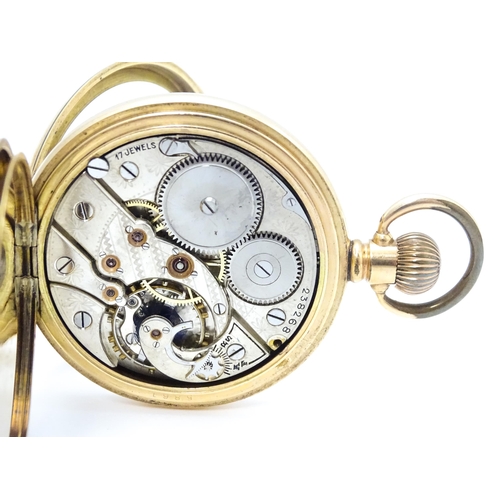 924 - A gold plated pocket watch with white enamel dial and subsidiary seconds dial, the 14ct gold plated ... 