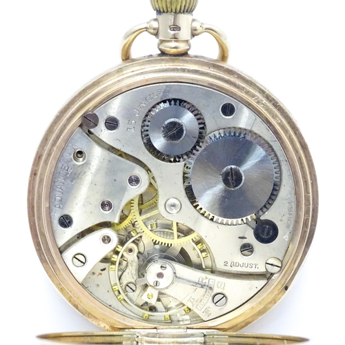 927 - A 9ct gold cased half hunter side wind pocket watch, the white enamel dial with Roman numerals and s... 