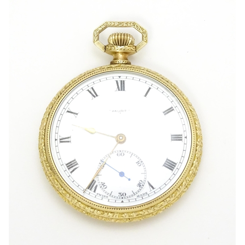 928 - An ' Akurit ' gold plated open face top wind pocket watch. Swiss made. The case made by Illinois Wat... 