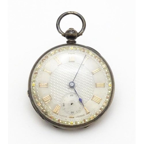 931 - A Swiss pocket / fob watch with silvered dial and Roman numerals, the dial and movement signed Baume... 