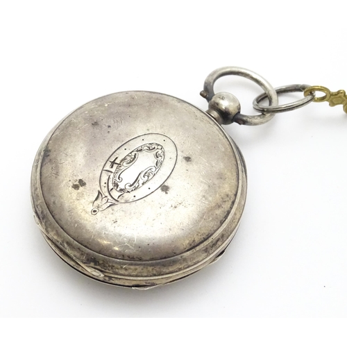 932 - A  Victorian silver cased pocket watch hallmarked Birmingham 1885 maker Waltham Watch Co. Together w... 