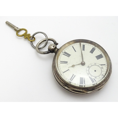 932 - A  Victorian silver cased pocket watch hallmarked Birmingham 1885 maker Waltham Watch Co. Together w... 