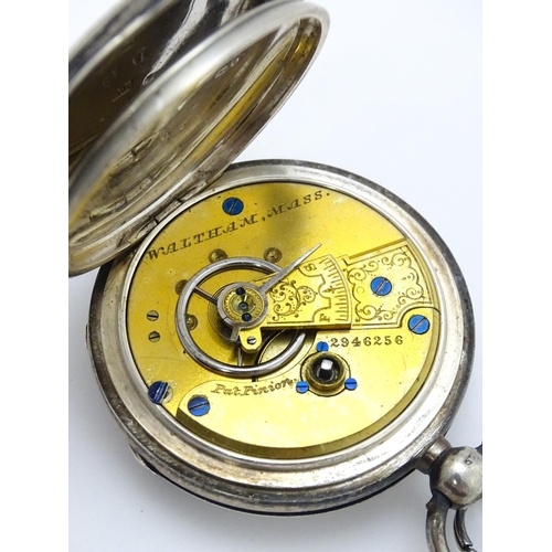 932 - A  Victorian silver cased pocket watch hallmarked Birmingham 1885 maker Waltham Watch Co. Together w... 