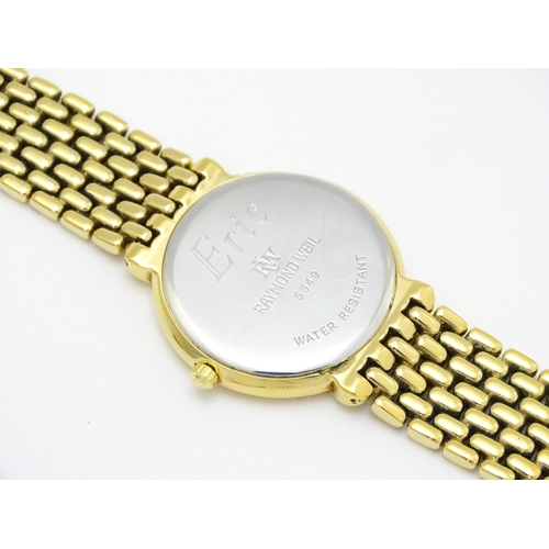 934 - A Raymond Weil gold plated stainless steel quartz bracelet wristwatch, the white dial with Roman num... 