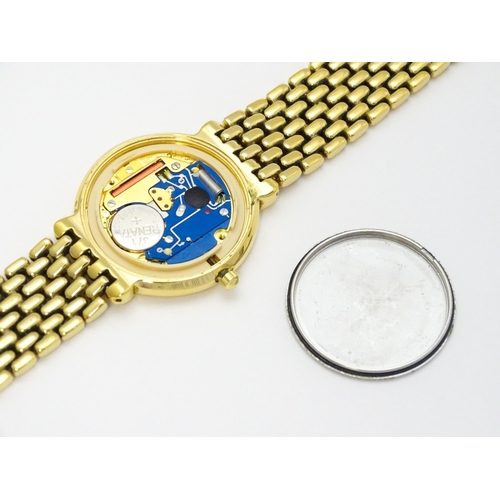 934 - A Raymond Weil gold plated stainless steel quartz bracelet wristwatch, the white dial with Roman num... 