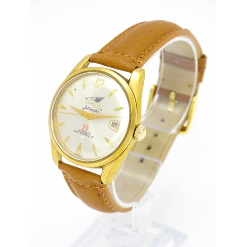 936 - A Garuda Jetmaster gentlemens automatic wristwatch, the dial with date aperture and gilt batons and ... 