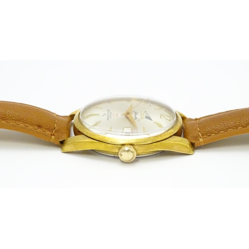 936 - A Garuda Jetmaster gentlemens automatic wristwatch, the dial with date aperture and gilt batons and ... 